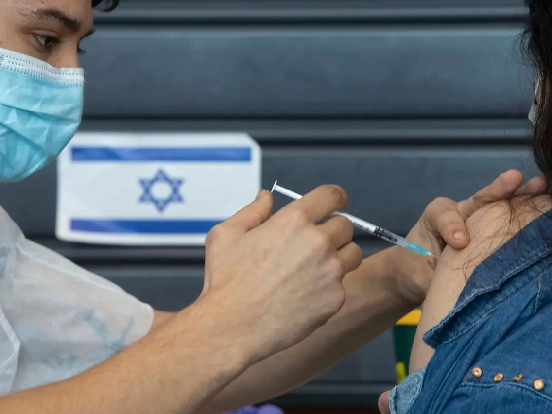 Israel aims to vaccinate 150,000 people per day by next week